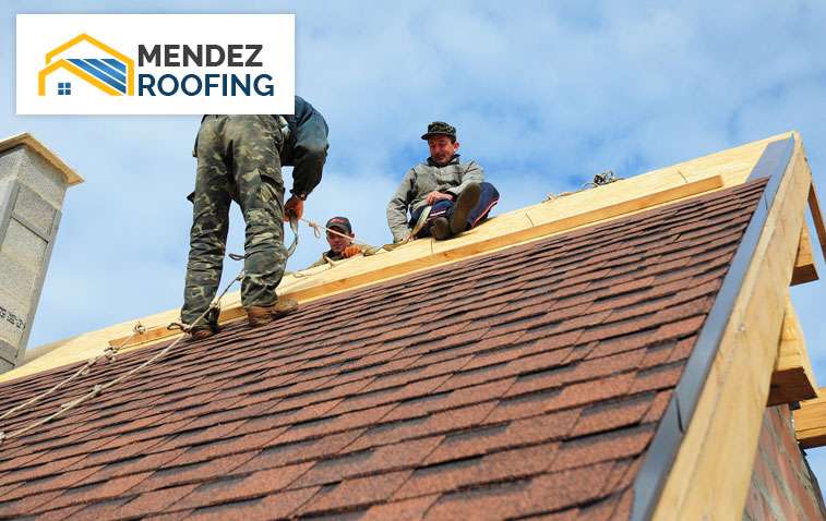 Roofing Contractors At Work